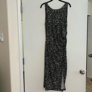 Black and white full length sleeveless dress with slit to the knee